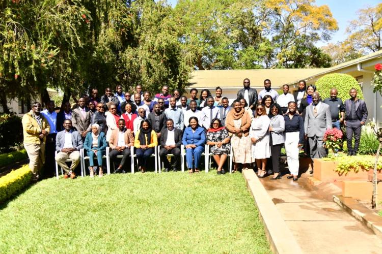 PARTICIPANTS POSE FOR A PHOTO